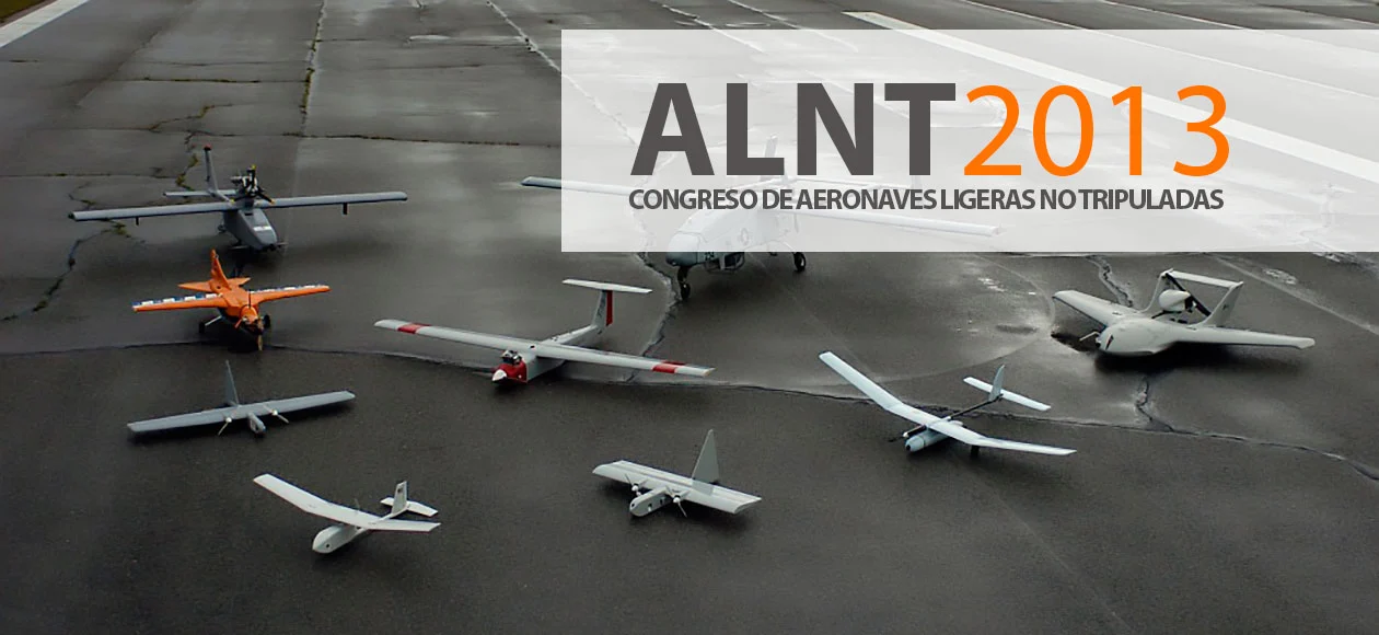 A variety of unmanned aerial vehicles (UAVs) are lined up on an airstrip, highlighting different designs and capabilities.