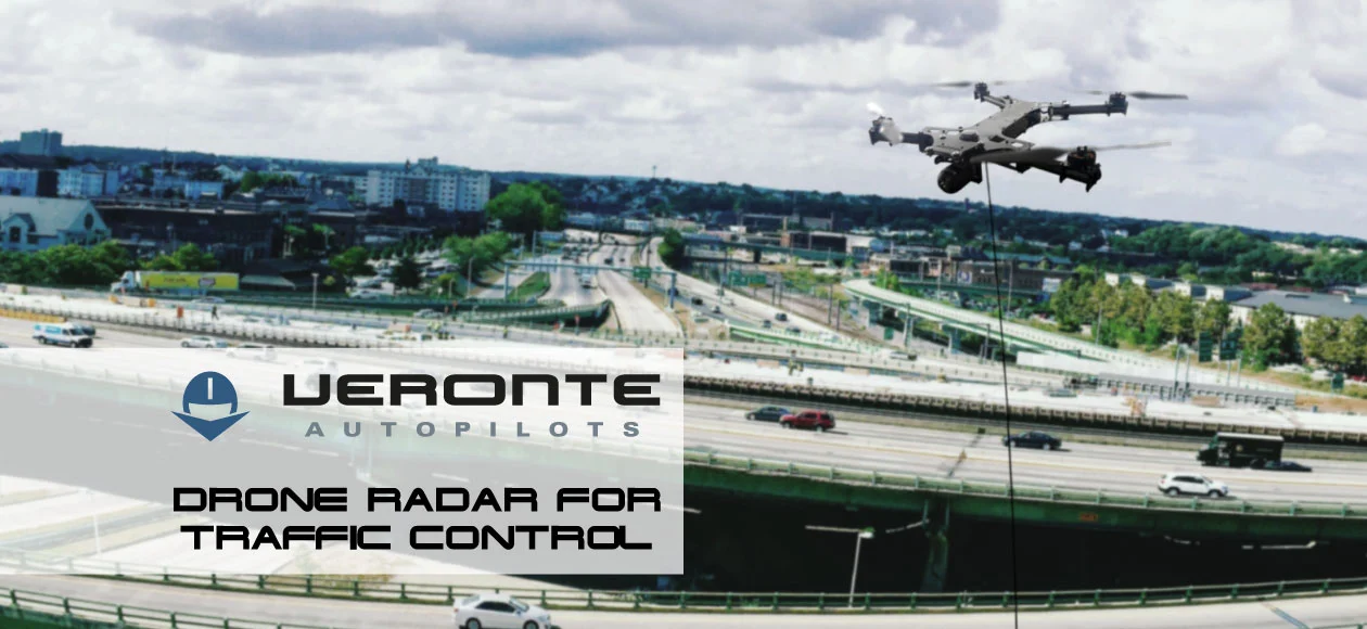 Drone equipped with radar hovering over a busy highway for traffic monitoring.