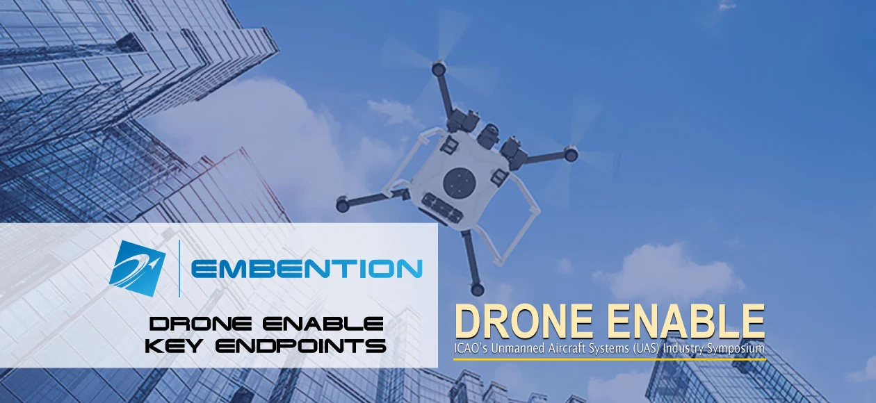 A drone flies near skyscrapers, symbolizing Embention’s contributions to ICAO’s Drone Enable symposium on UAS industry advancements.