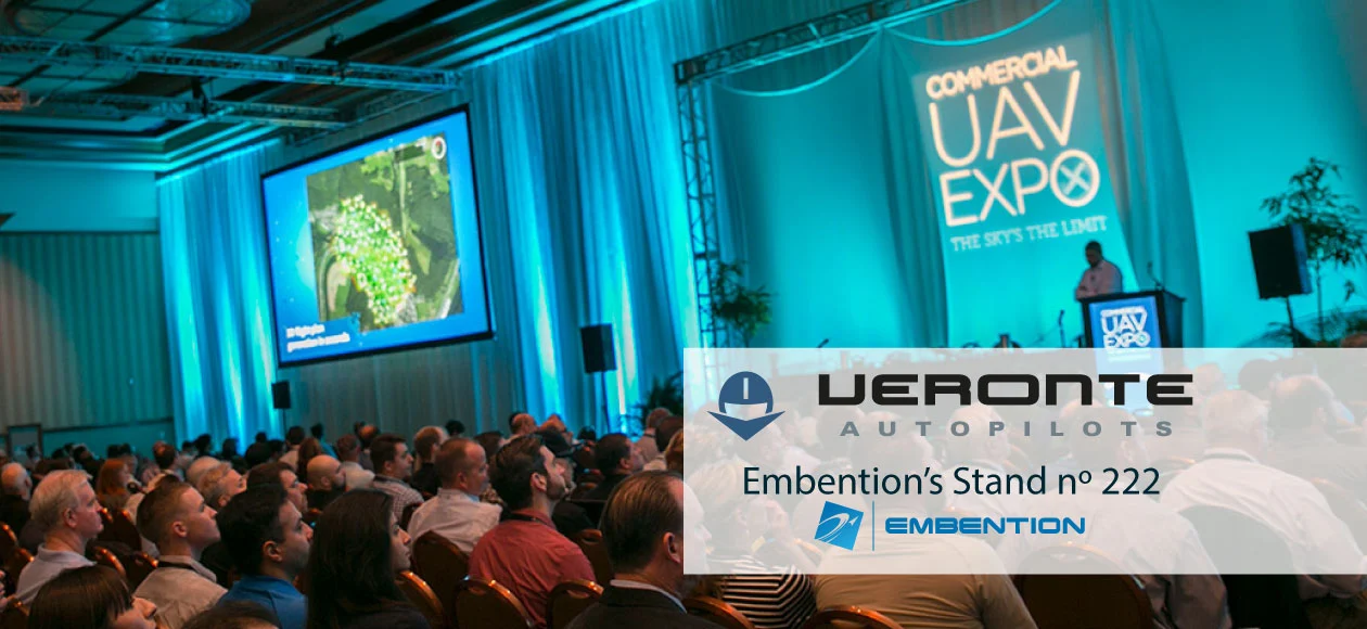 Attendees at the Commercial UAV Expo engage with Veronte Autopilot technology at Embention’s Stand nº 222
