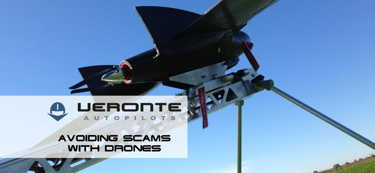 A drone mounted on a launch mechanism in a clear, sunny field, promoting Veronte's scam prevention in drone usage.