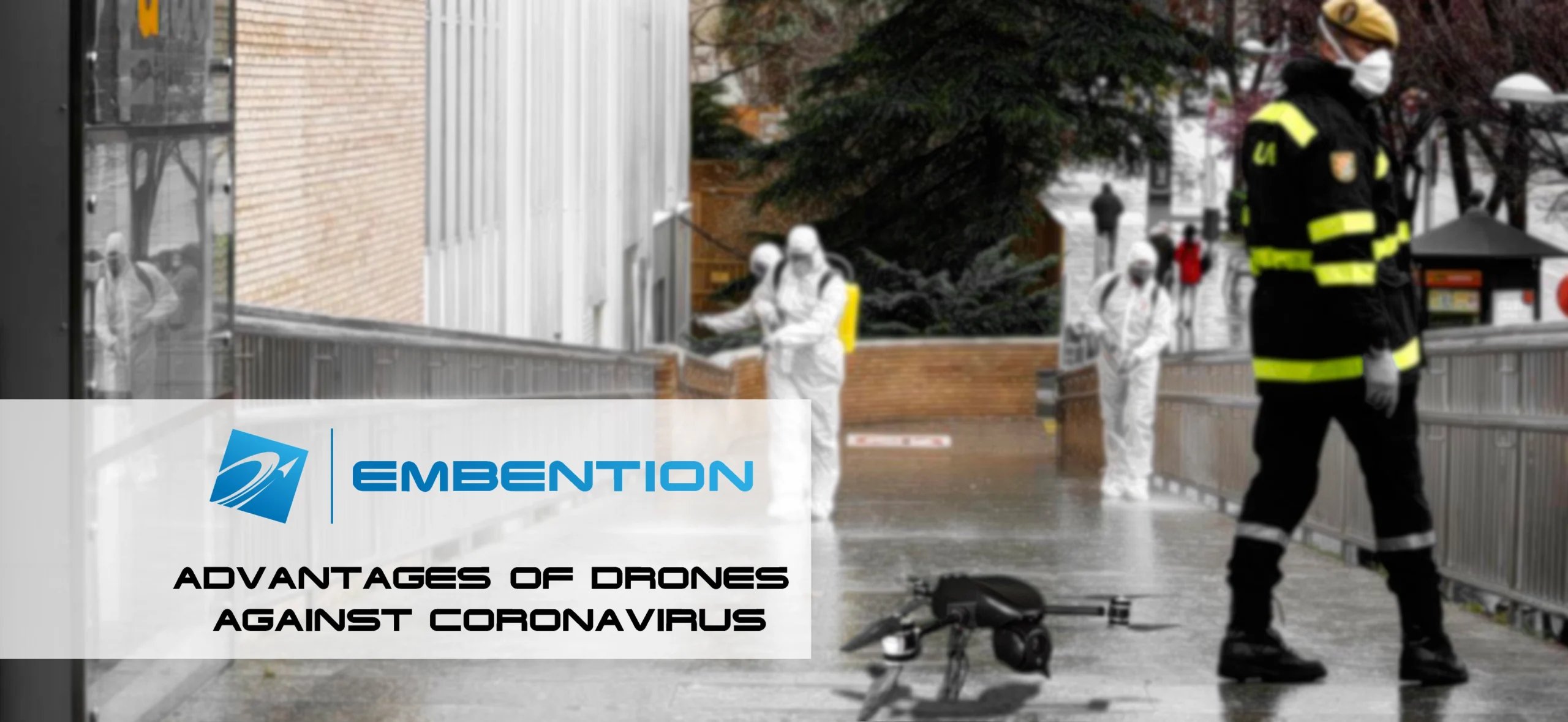Promotional image featuring workers in protective gear with a drone, highlighting Embention's advantages of using drones against coronavirus.